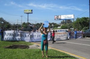 Rosie Ramsey showing international support for the water law at a protest in San Salvador